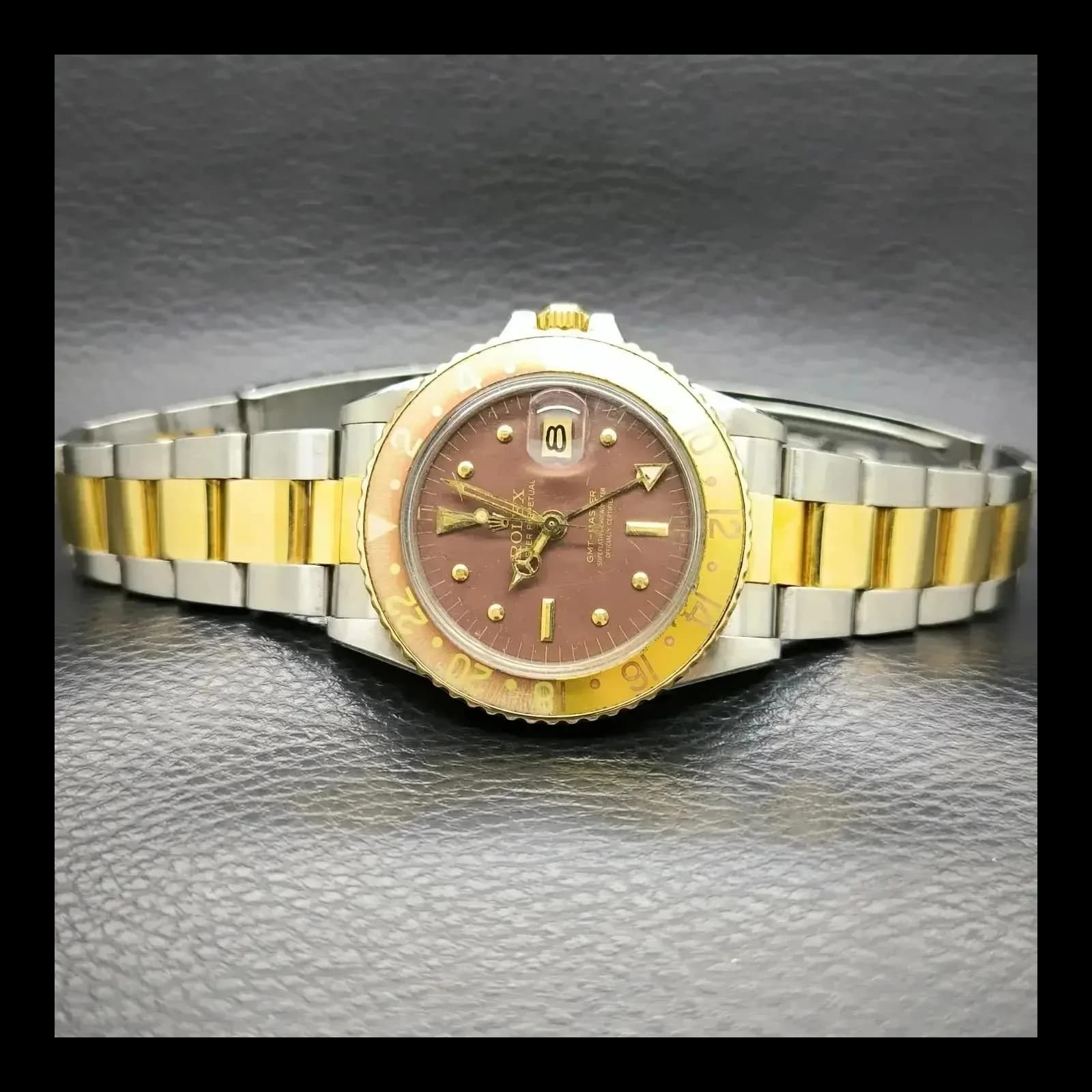 Thumb Rolex GMT Master 1675 Black Nipple Gilt Dial