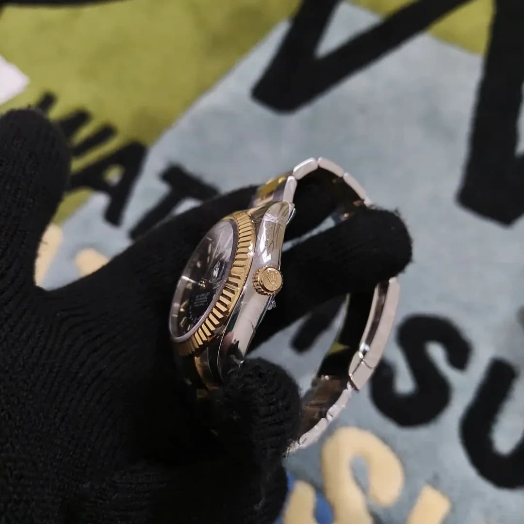 Thumb Sky-Dweller Stainless Steel / Yellow Gold / Black