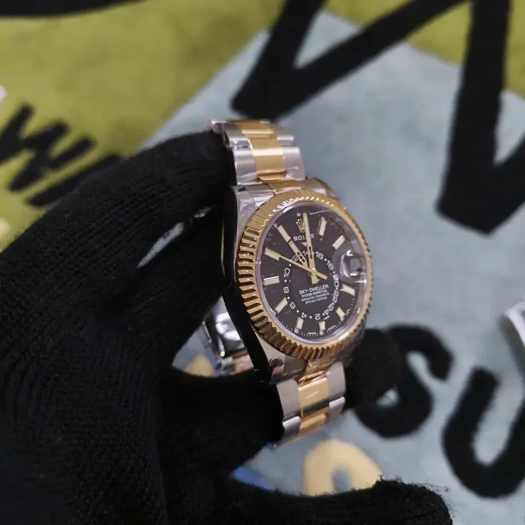 Thumb Sky-Dweller Stainless Steel / Yellow Gold / Black