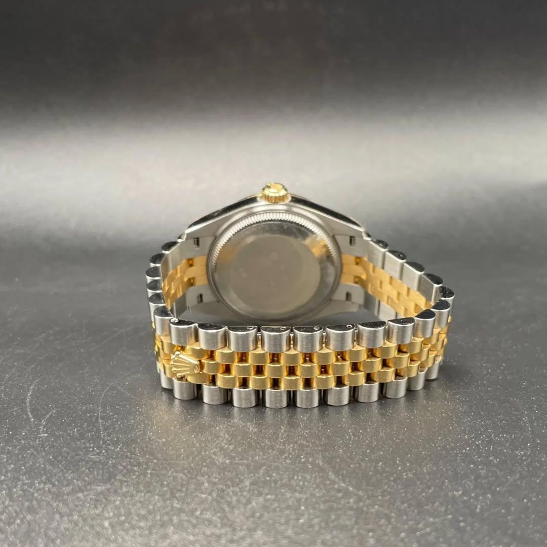 Thumb Datejust 31 Stainless Steel / Yellow Gold / Fluted / Olive - Roman / Jubilee