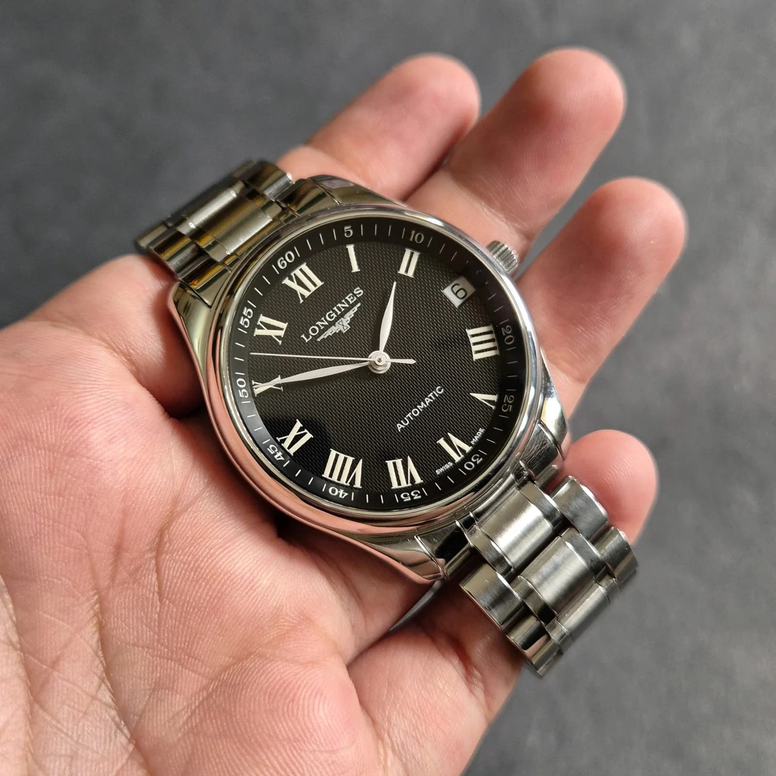 Thumb Master Collection 42 Date Stainless Steel / Black Roman / Bracelet