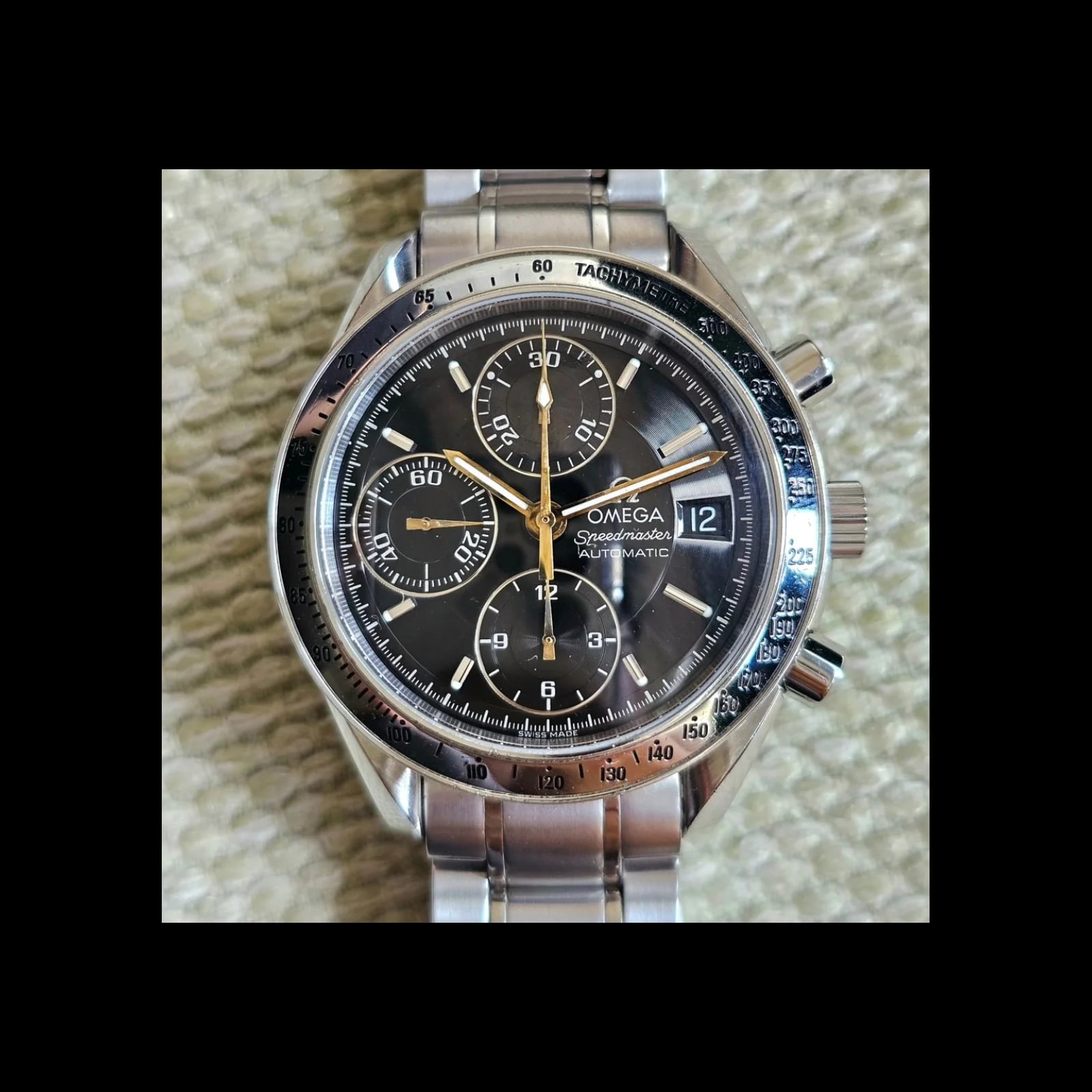 Speedmaster Date Stainless Steel / Black / Bracelet / Golden Chronograph Hands