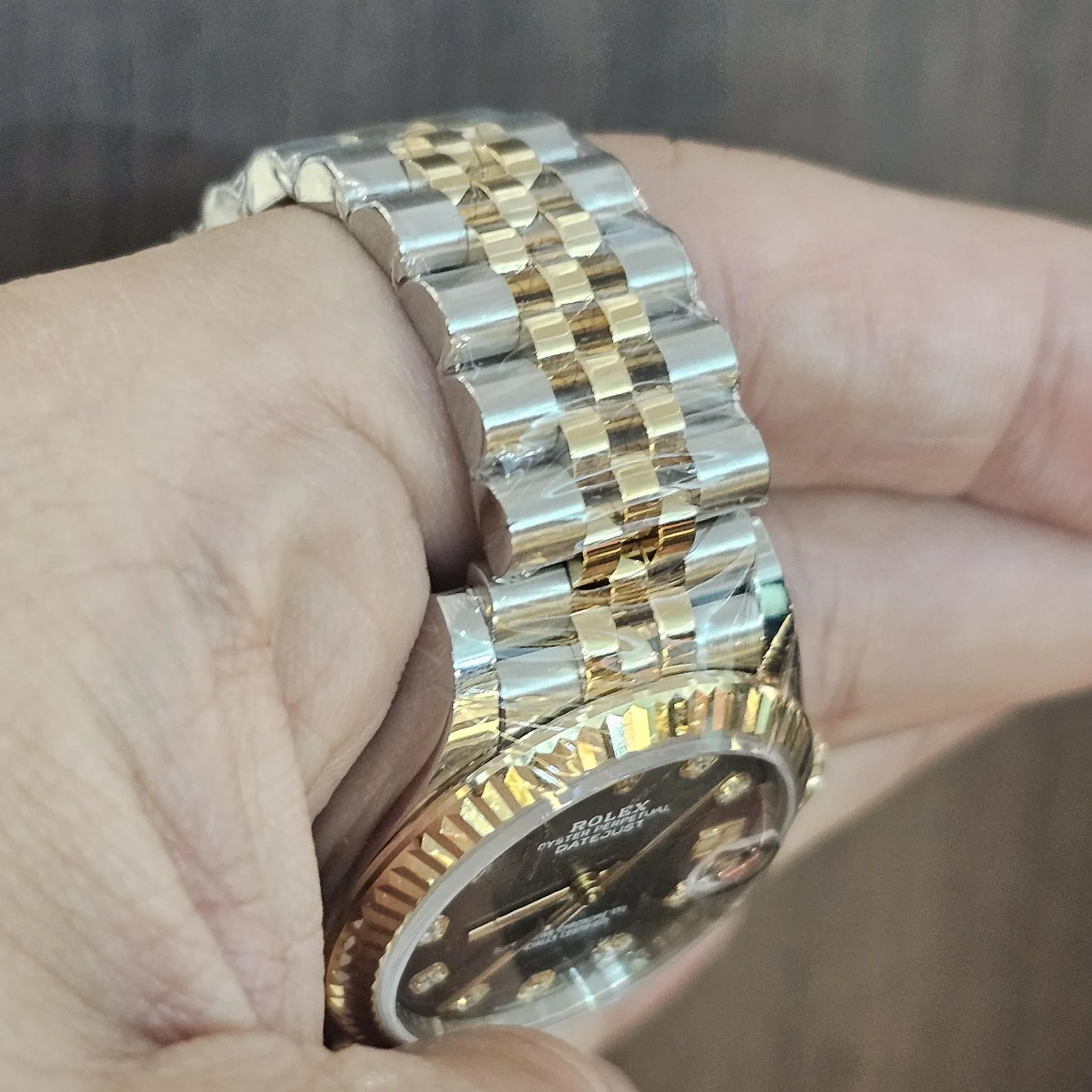 Thumb Datejust 31 Stainless Steel / Yellow Gold / Fluted / Black MOP / Jubilee