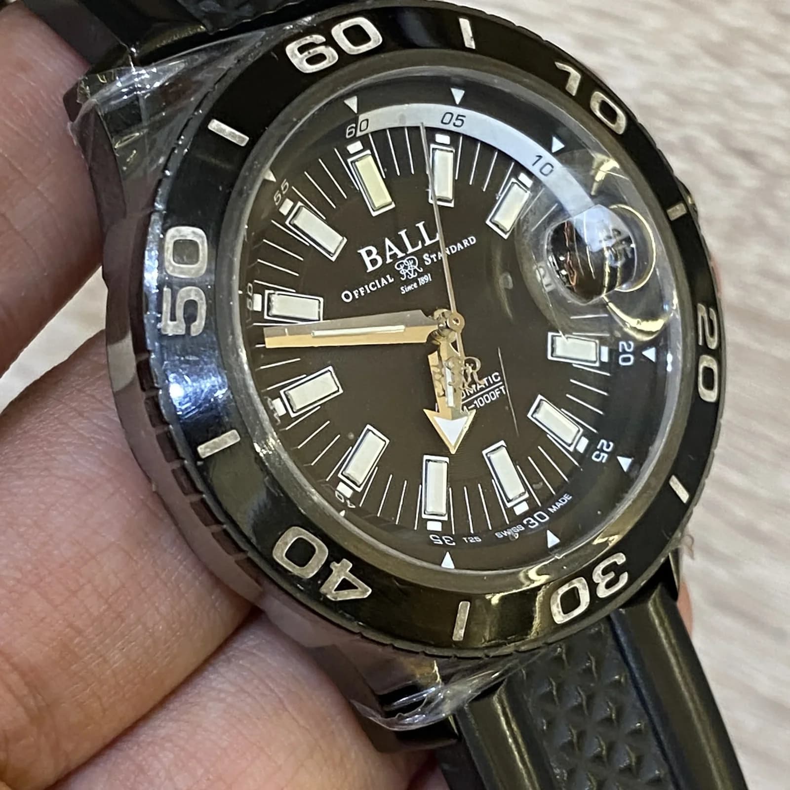 Thumb Fireman NECC Titanium Automatic / Black / Rubber