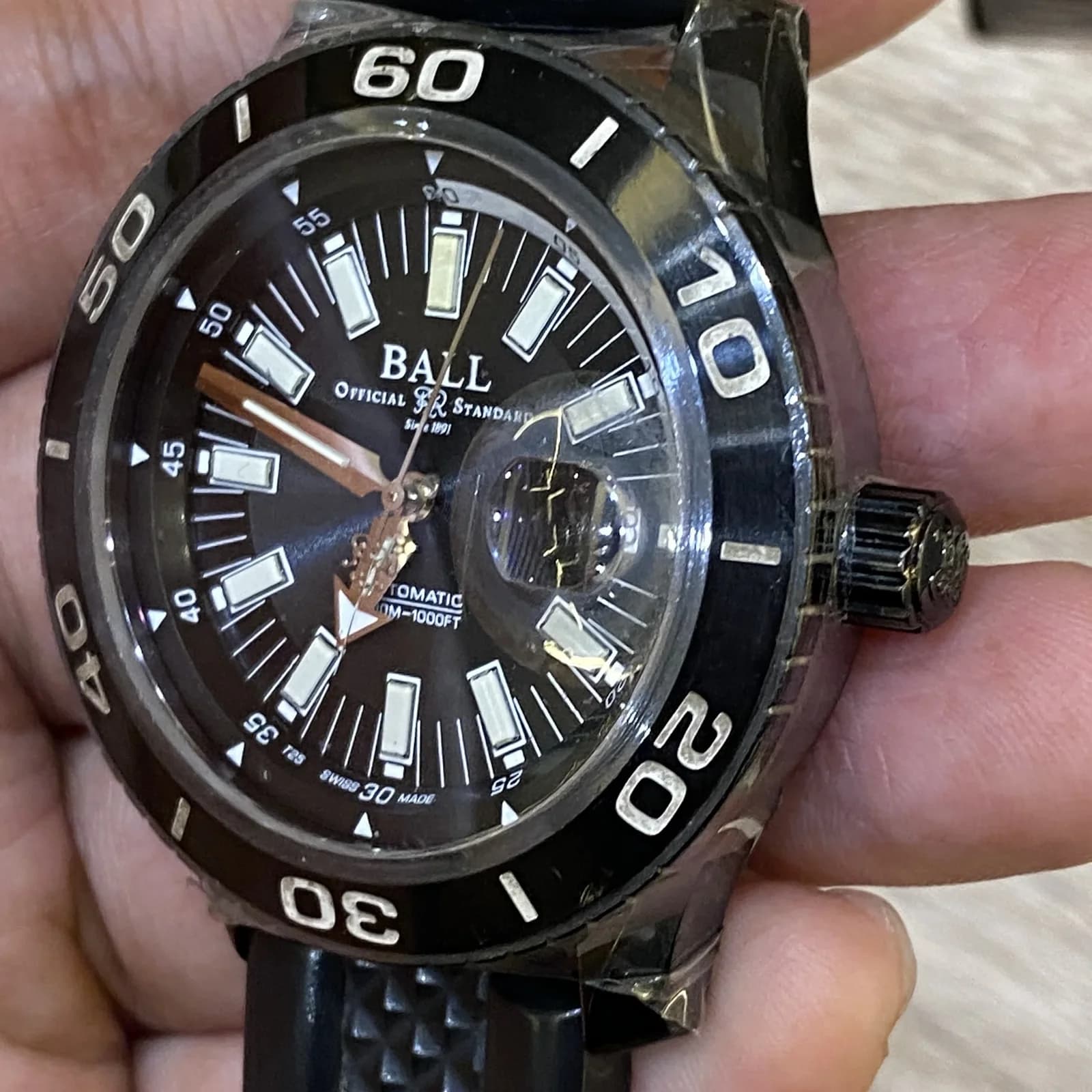 Thumb Fireman NECC Titanium Automatic / Black / Rubber