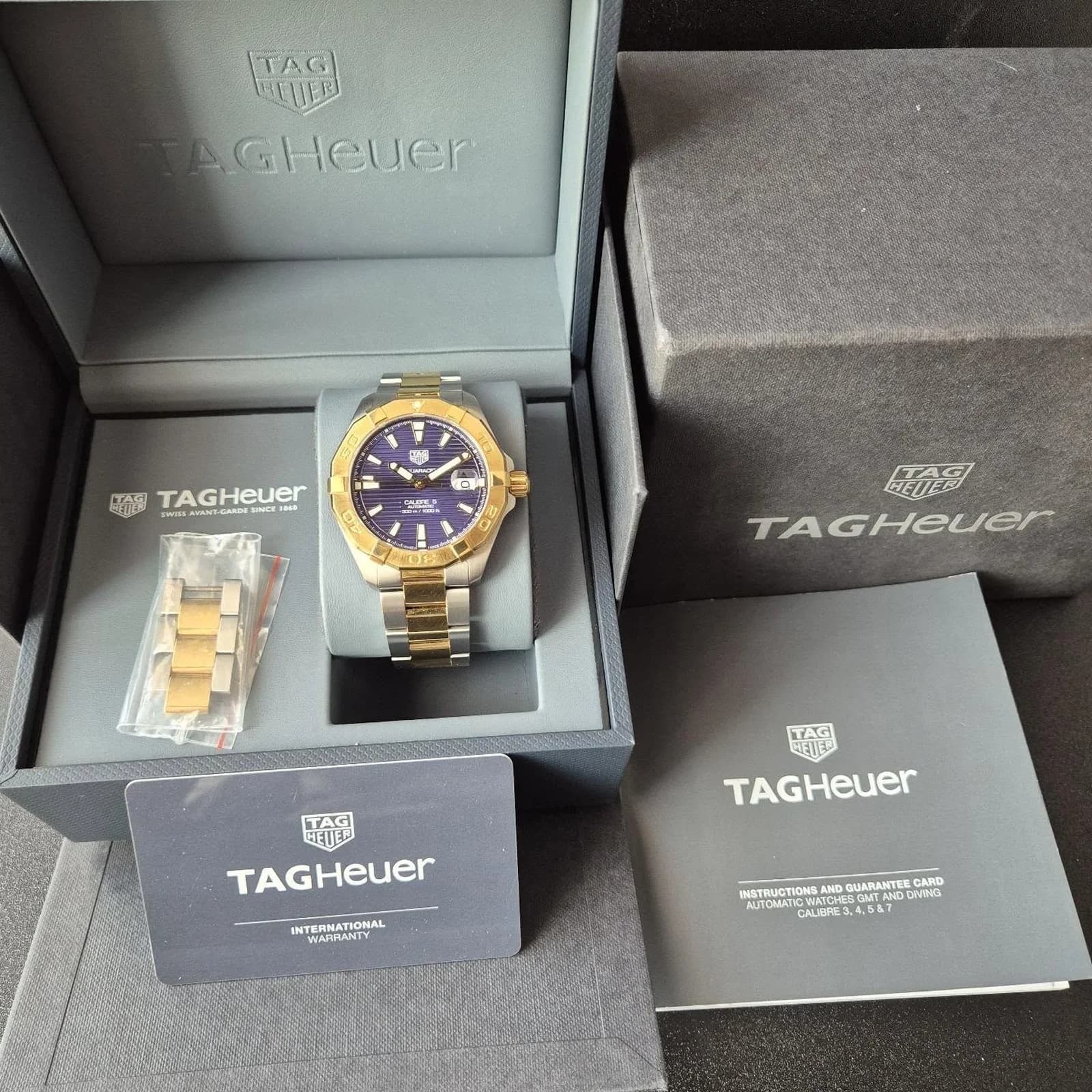 Thumb Aquaracer Calibre 5 41 Stainless Steel - Yellow Gold / Blue / Bracelet
