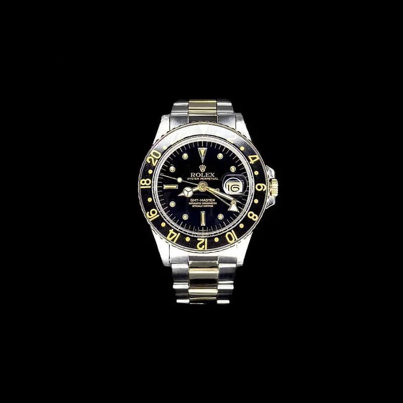 Thumb Rolex GMT Master 1675 Black Nipple Gilt Dial