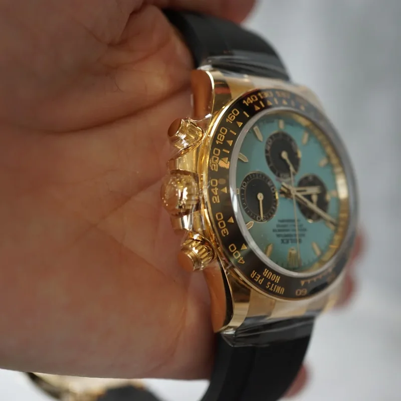 Thumb Cosmograph Daytona Yellow Gold - Cerachrom / Turquoise - Black / Oysterflex