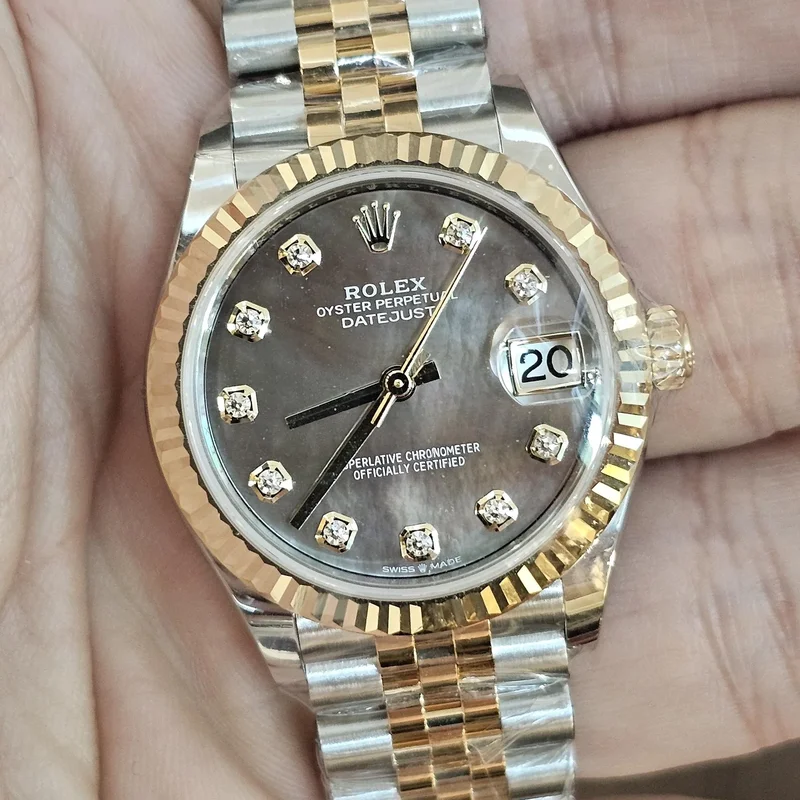 Datejust 31 Stainless Steel / Yellow Gold / Fluted / Black MOP / Jubilee