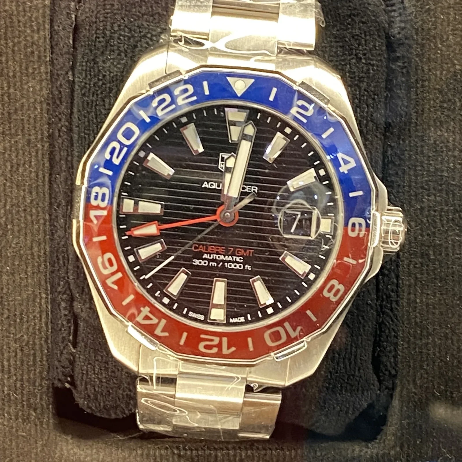 Aquaracer 300M Calibre 7 GMT Stainless Steel / Black / Bracelet