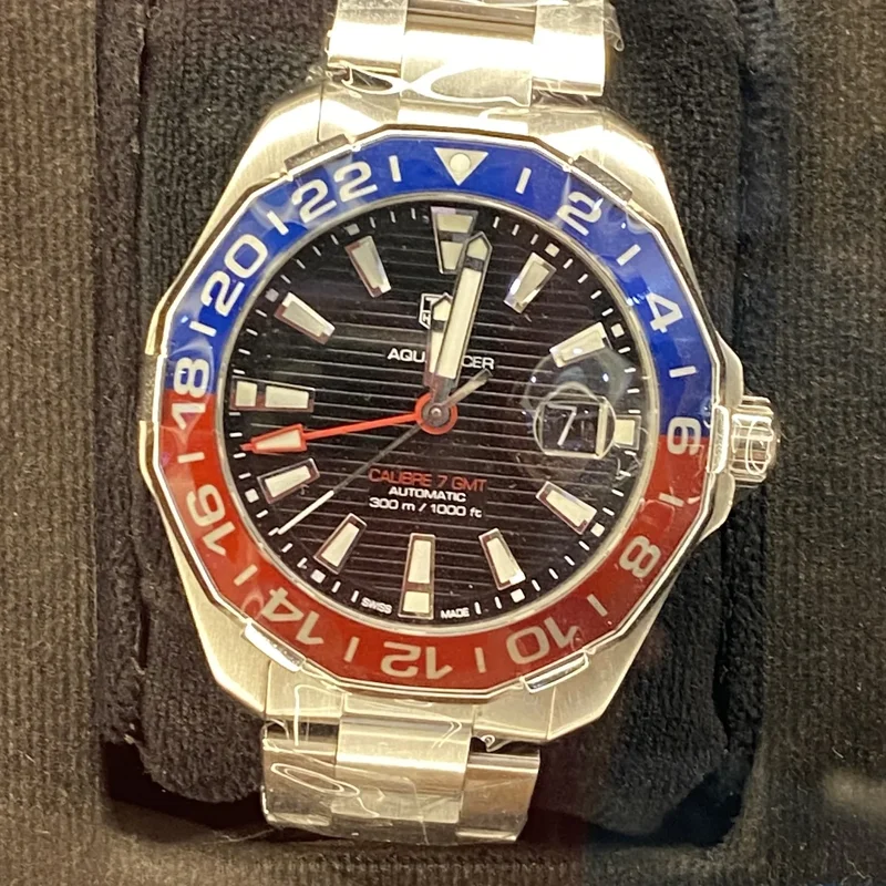 Aquaracer 300M Calibre 7 GMT Stainless Steel / Black / Bracelet