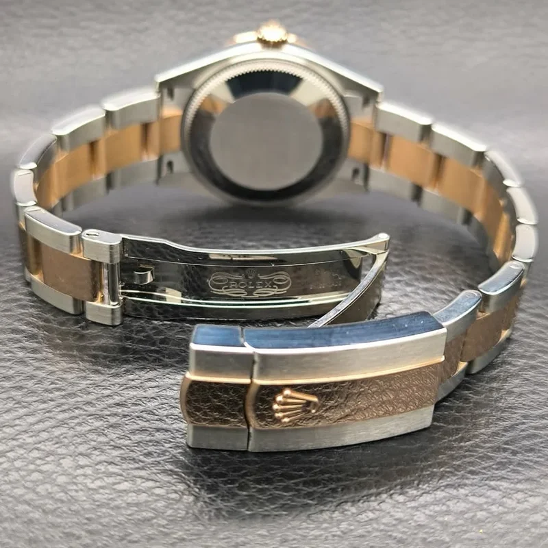 Thumb Datejust 31 Stainless Steel/ Rose Gold / Fluted / Chocolate - Roman / Oyster