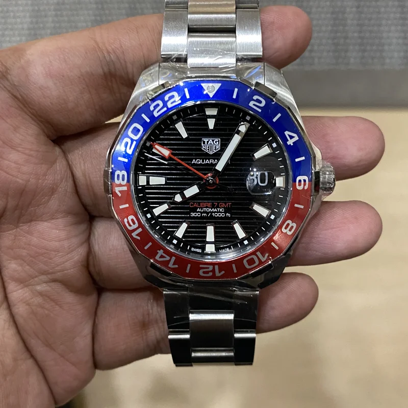 Aquaracer 300M Calibre 7 GMT Stainless Steel / Black / Bracelet