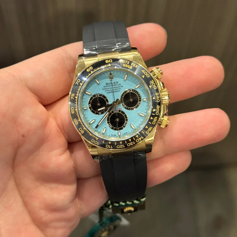 Cosmograph Daytona Yellow Gold - Cerachrom / Turquoise - Black / Oysterflex