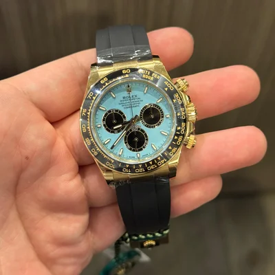 Cosmograph Daytona Yellow Gold - Cerachrom / Turquoise - Black / Oysterflex