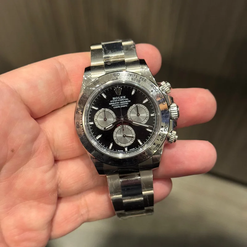 Cosmograph Daytona White Gold / Black - Steel / Oyster