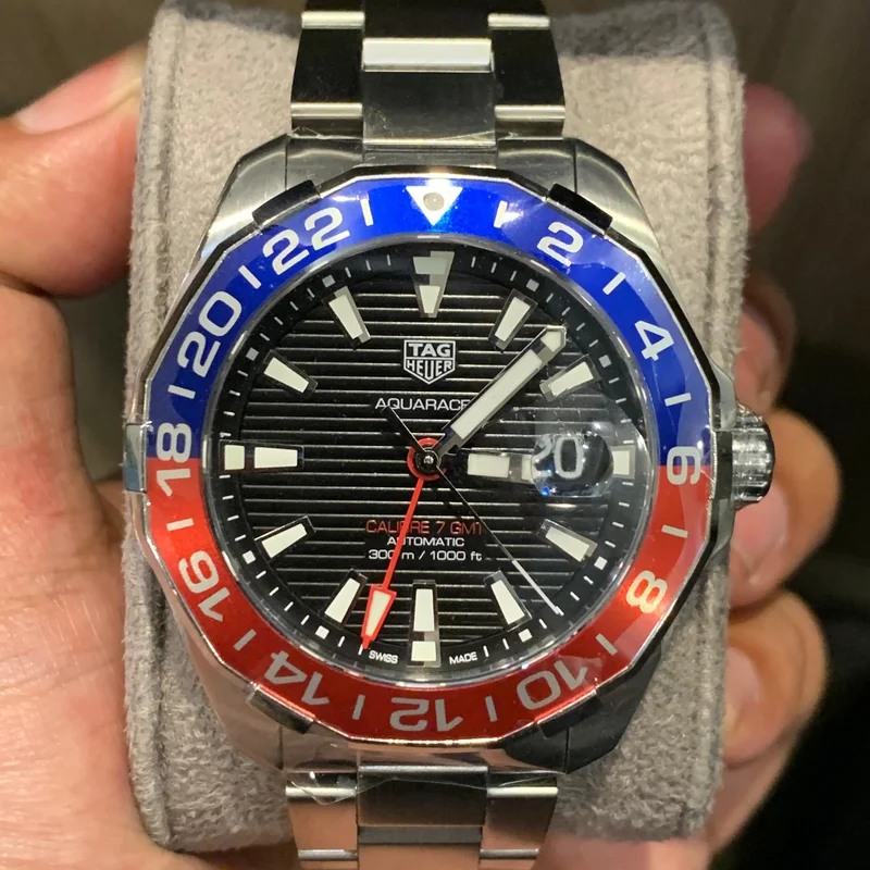 Aquaracer 300M Calibre 7 GMT Stainless Steel / Black / Bracelet