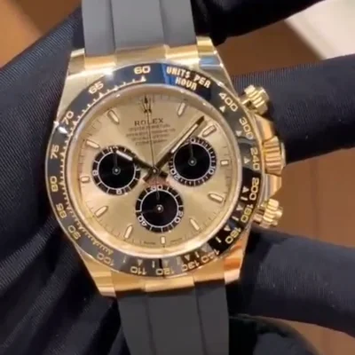Cosmograph Daytona Yellow Gold - Cerachrom / Champagne - Black / Oysterflex