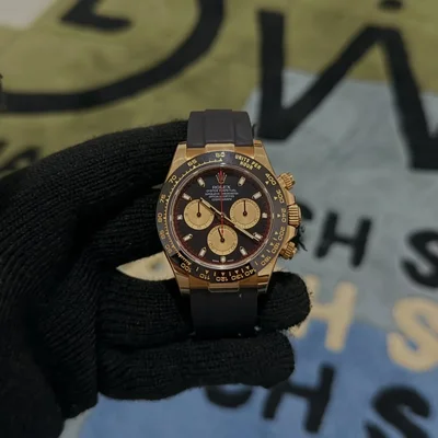 Cosmograph Daytona Yellow Gold / Cerachrom / Black / Oysterflex