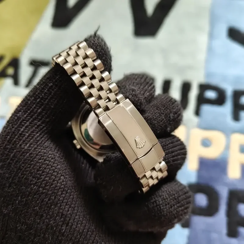 Thumb Datejust 36 Stainless Steel / Fluted / White Roman / Jubilee