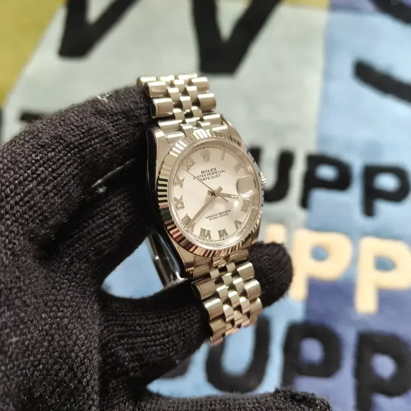 Thumb Datejust 36 Stainless Steel / Fluted / White Roman / Jubilee