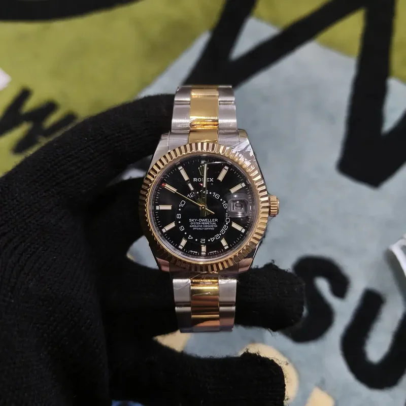 Sky-Dweller Stainless Steel / Yellow Gold / Black