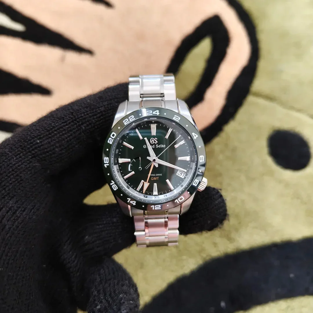 Spring Drive SBGE257 GMT Stainless Steel / Green