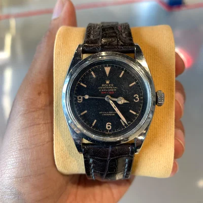 Explorer “Red Depth” Black Gilt Dial