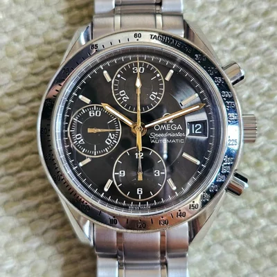 Speedmaster Date Stainless Steel / Black / Bracelet / Golden Chronograph Hands