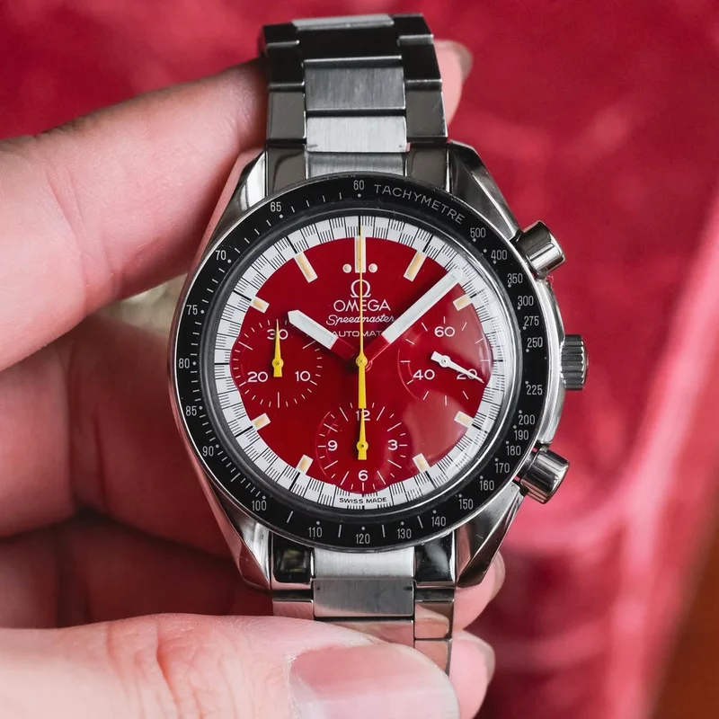 Speedmaster Reduced Stainless Steel / Red / Strap / Schumacher