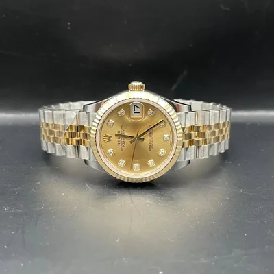 Datejust 31 Stainless Steel / Yellow Gold / Fluted / Champagne - Diamond / Jubilee