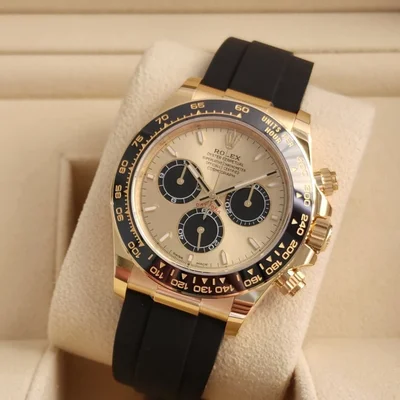 Cosmograph Daytona Yellow Gold - Cerachrom / Champagne - Black / Oysterflex