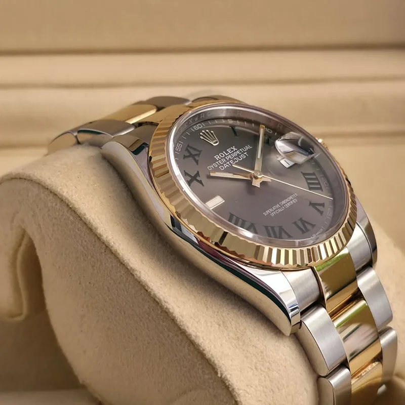 Thumb Datejust 36 Stainless Steel / Yellow Gold / Fluted / Silver Roman / Oyster