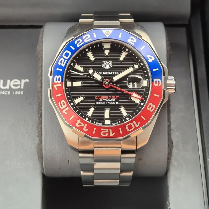 Aquaracer 300M Calibre 7 GMT Stainless Steel / Black / Bracelet