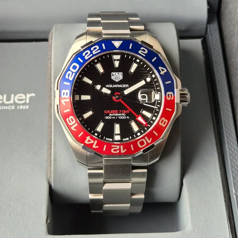 Aquaracer 300M Calibre 7 GMT Stainless Steel / Black / Bracelet