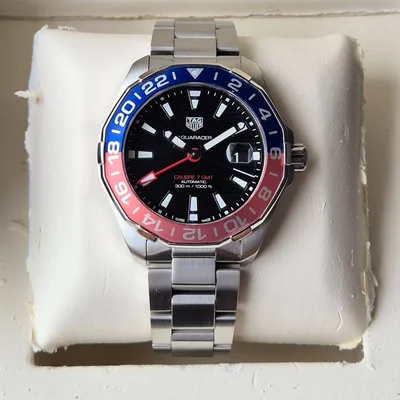 Aquaracer 300M Calibre 7 GMT Stainless Steel / Black / Bracelet