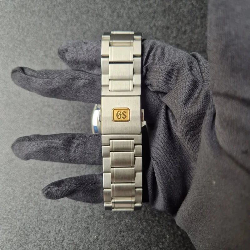 Thumb Spring Drive Evolution 9 Stainless Steel / Lake Suwa / Bracelet