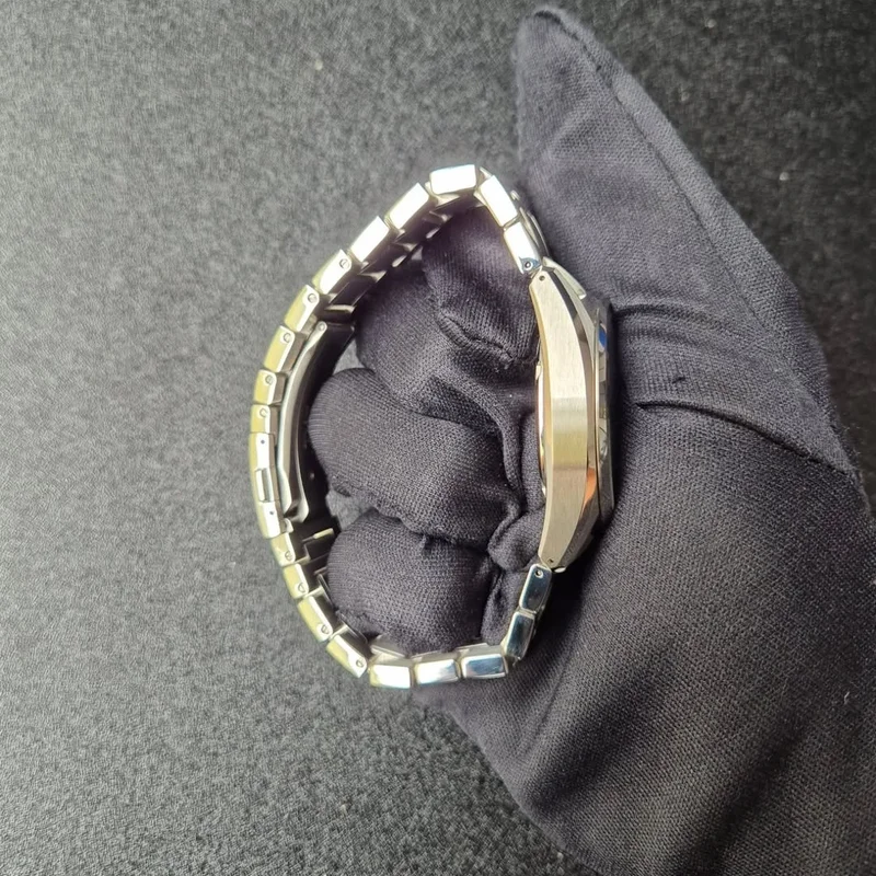 Thumb Spring Drive Evolution 9 Stainless Steel / Lake Suwa / Bracelet