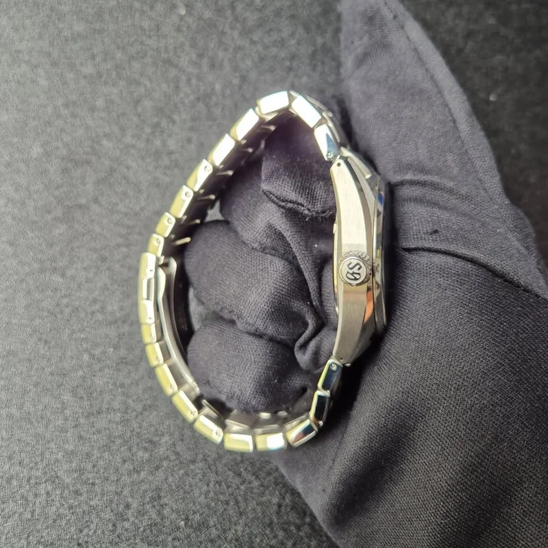 Thumb Spring Drive Evolution 9 Stainless Steel / Lake Suwa / Bracelet